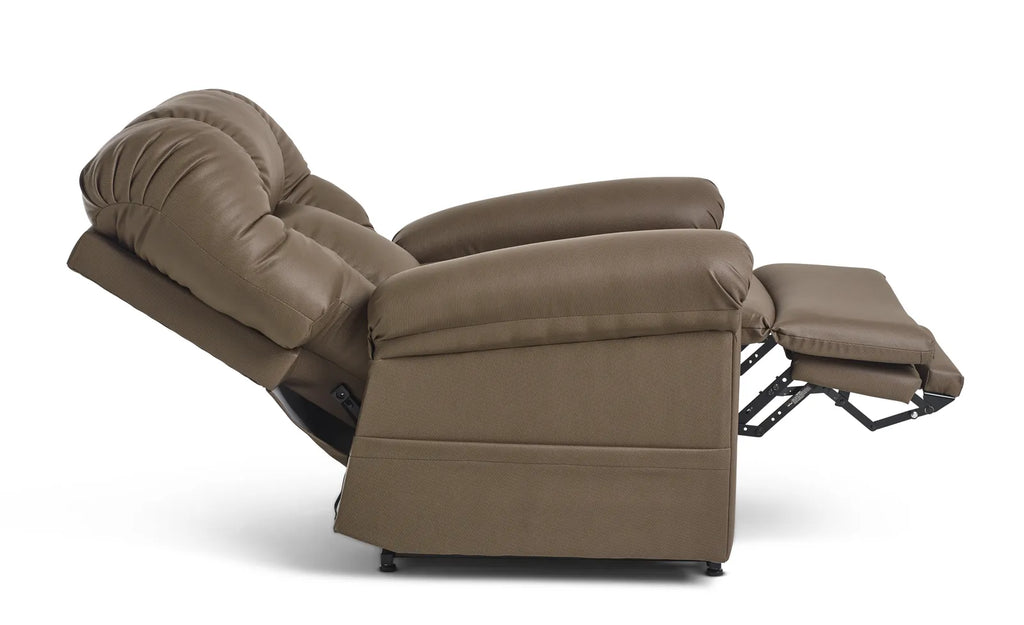 The chair from the side in a deeper recline, the back angled well past upright and the footrest fully extended in line with the seat on its scissor linkage.